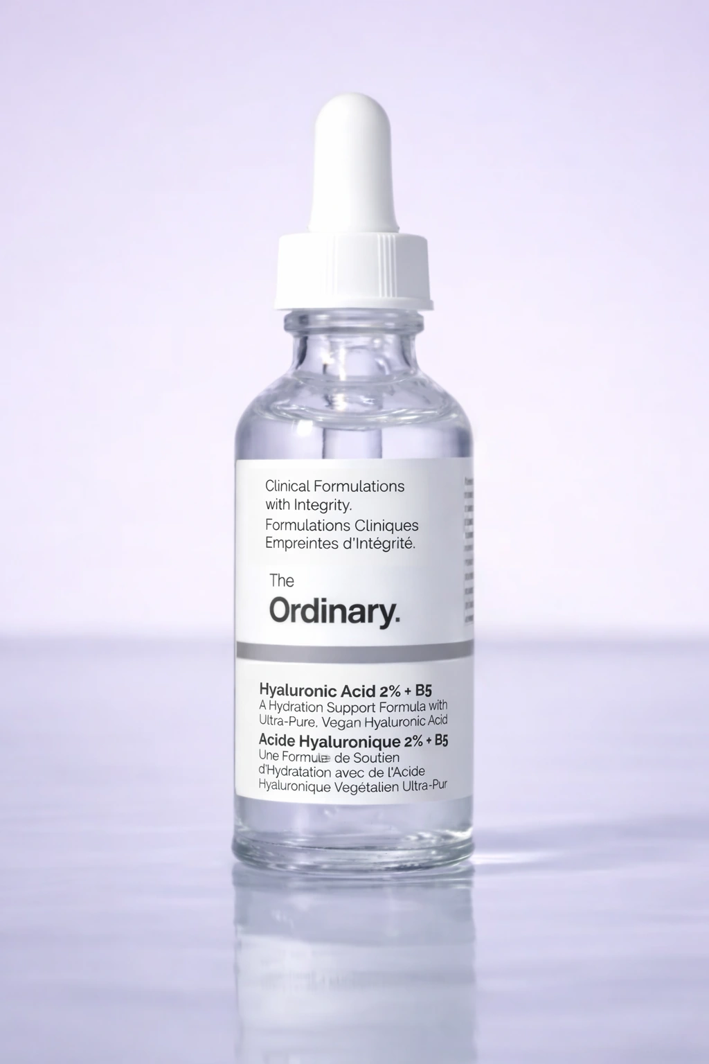 The Ordinary Hyaluronic Acid 2% + B5 serum upright against a lavender backdrop.